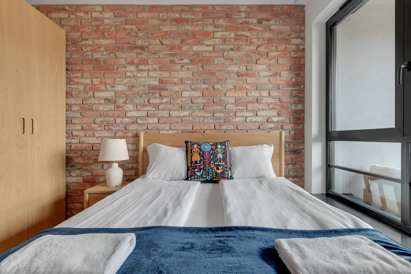 Sypialnia apartamentu w inwestycji DOKI Living
